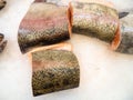 Sliced Ã¢â¬â¹Ã¢â¬â¹salmon on ice. Pieces of the freshest fish on the counter